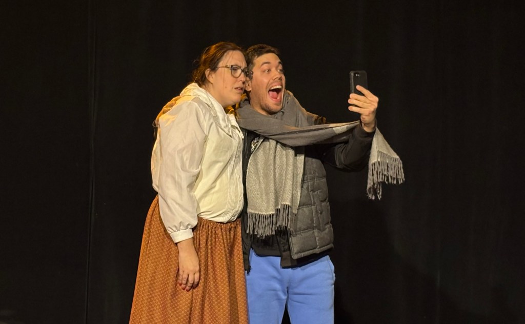 Mark (Tony Quiñones) takes a selfie with his 19th-century ancestor Sally in "Hot Dog of Destiny."